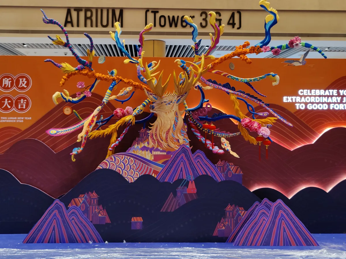 Colourful Glenfiddich Lunar New Year stag installation in a mall atrium